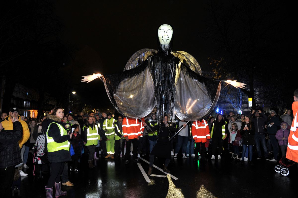Giant puppet Ghost of Christmas Future at Cheltenham Light Switch On